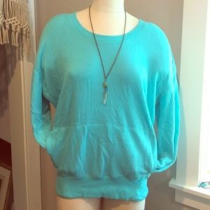 Turquoise sweatshirt with pockets